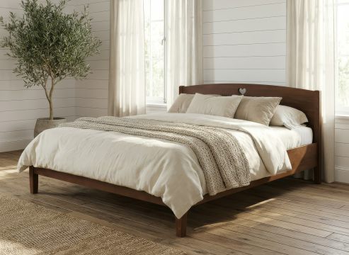 Eichenbett „Heidi“ in 180 x 200 cm mit niedrigem runden Fußteil und mit Kopfteil „Herz“